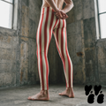 A male model wears bold red and white stripe leggings, circus core, clown core costume
