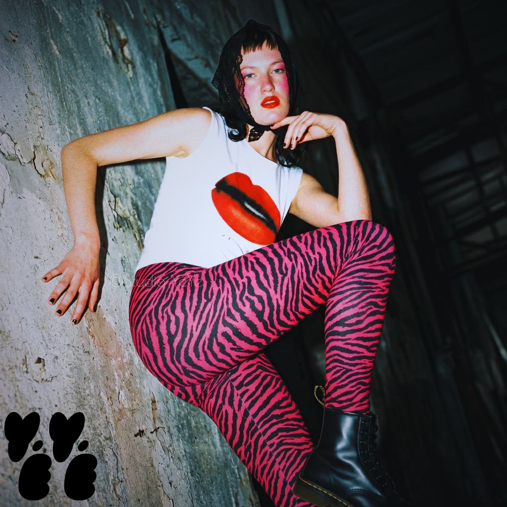 Hot pink and black hand-drawn tiger - zebra leggings by YéYé in model punk style