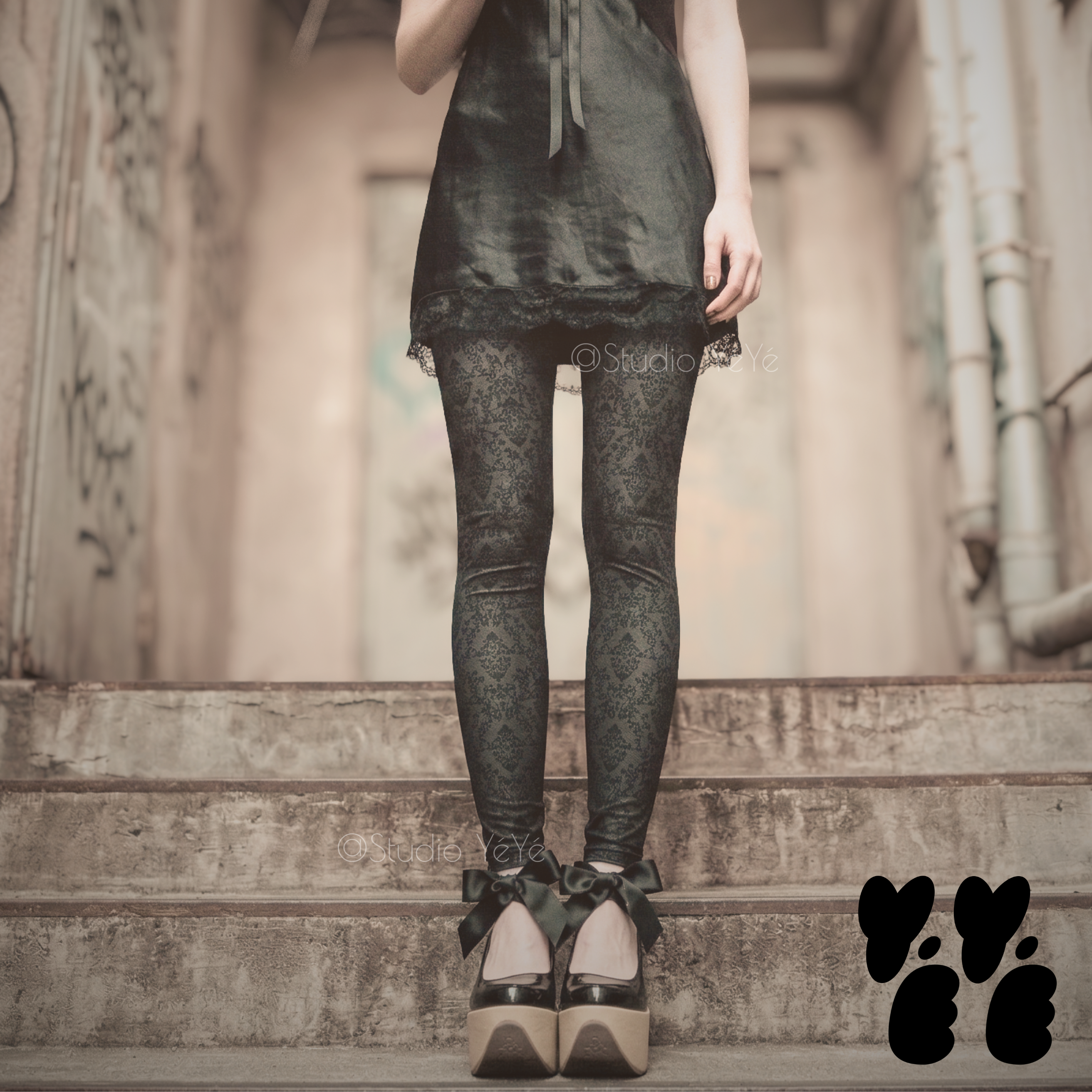 Dark damask print leggings by YéYé, styled with a satin mini dress with vivienne westwood rocking horse shoes