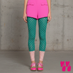 Two-tone teal green and pastel pink polka dot leggings by YéYé, styled with a hot pink blazer shorts set and pink glitter oxford shoes