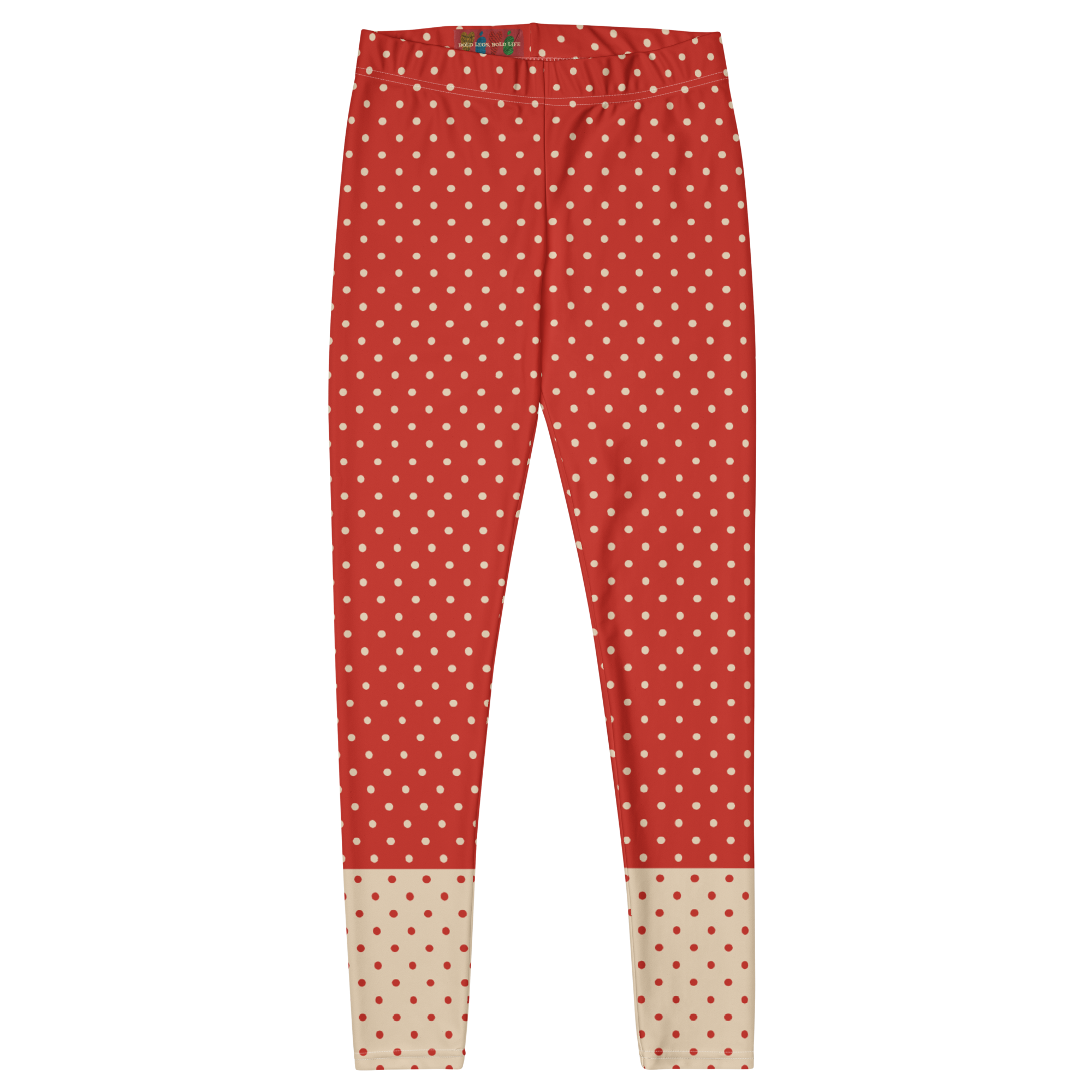 Two-tone red and cream polka dot leggings by YéYé - front flat