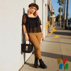 A plus size female model wears 2XL wears small polka dot legging in brown and mustard, with leopard beret and combat boots 