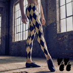 Off-white and black harlequin diamond mens leggings by YéYé, styled with black jazz shoes in an industrial warehouse