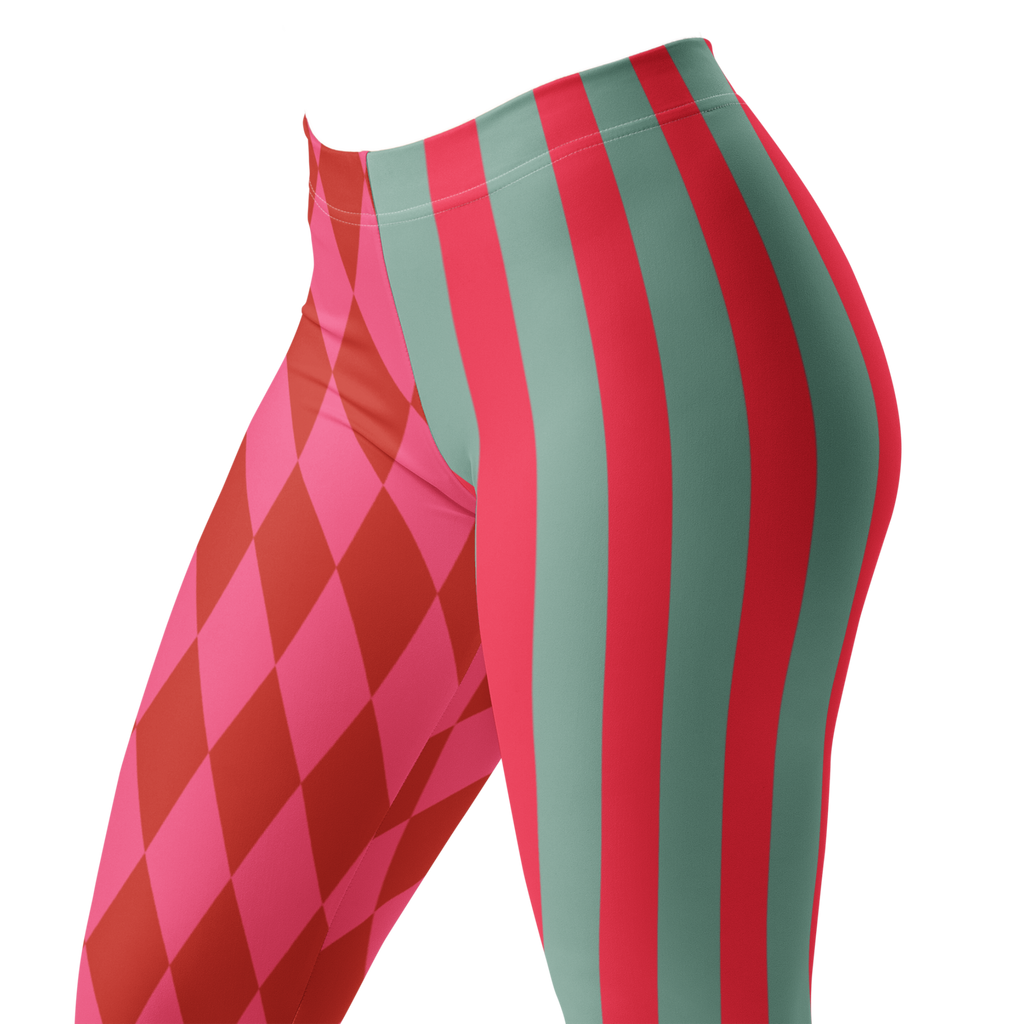 Pink and red harlequin jester leggings by YéYé with mismatched stripe and diamond pattern