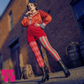 Pink and red harlequin jester leggings by YéYé with mismatched stripe and diamond pattern, styled with a red satin ruffle blouse, red scalloped shorts and black Victorian lace-up boots