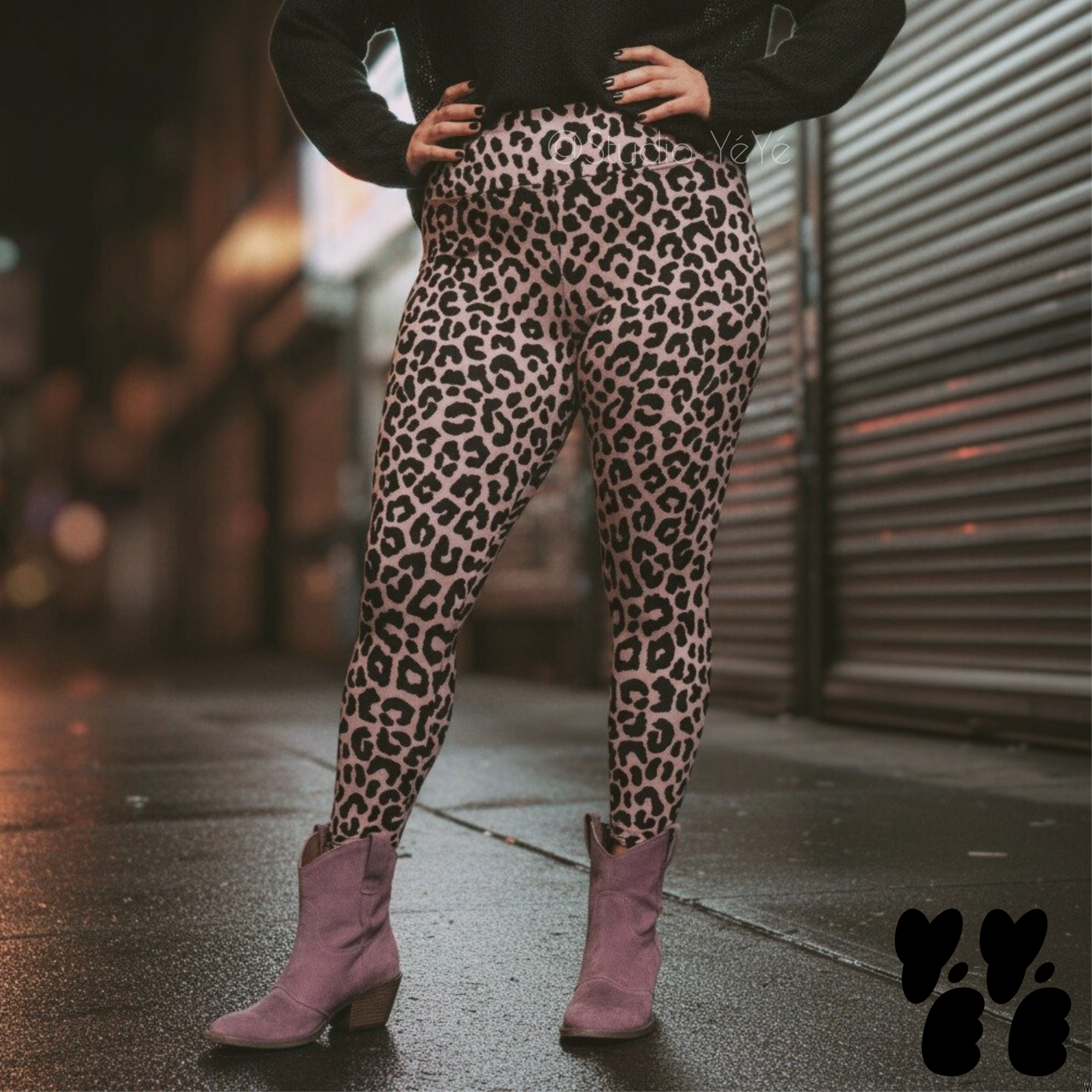 A plus sized female model wears 2XL leopard leggings in mauve pink