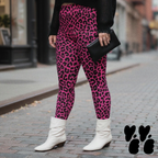 A plus size female model wears 2XL leopard print leggings in hot pink with vintage white boots.