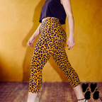 a model wears mustard yellow leopard animal printed cropped pants