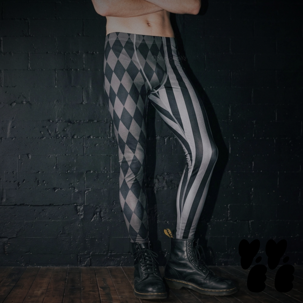 A mens model wears jester harlequin pattern leggings with grayscale, silent film costume 