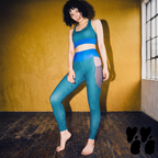 A hipster japanese model wears navy and teal striped leggings with pockets. Editorial edgy vibe.