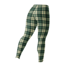 Designed by Studio YéYé —  green and cream tartan leggings for punk, trad and alt style. Soft palette, serious edge.