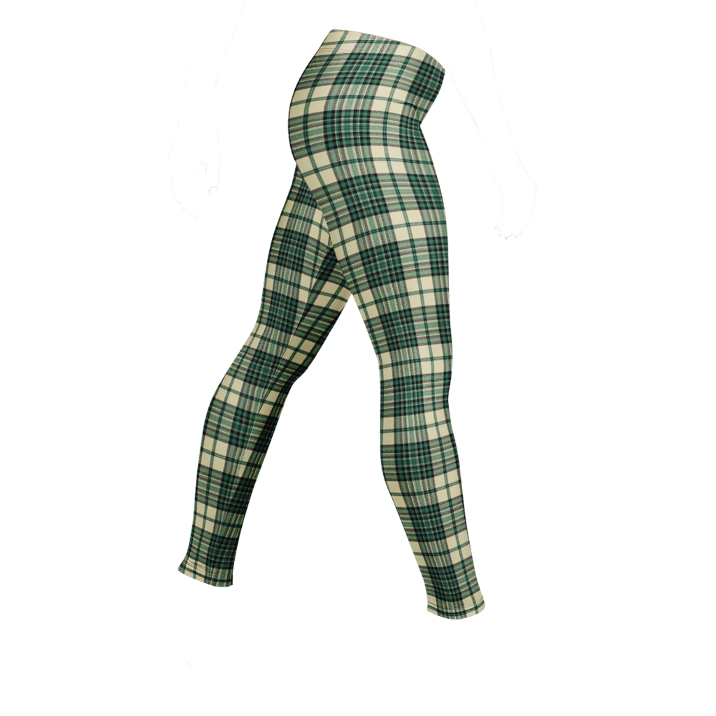 Designed by Studio YéYé —  green and cream tartan leggings for punk, trad and alt style. Soft palette, serious edge.