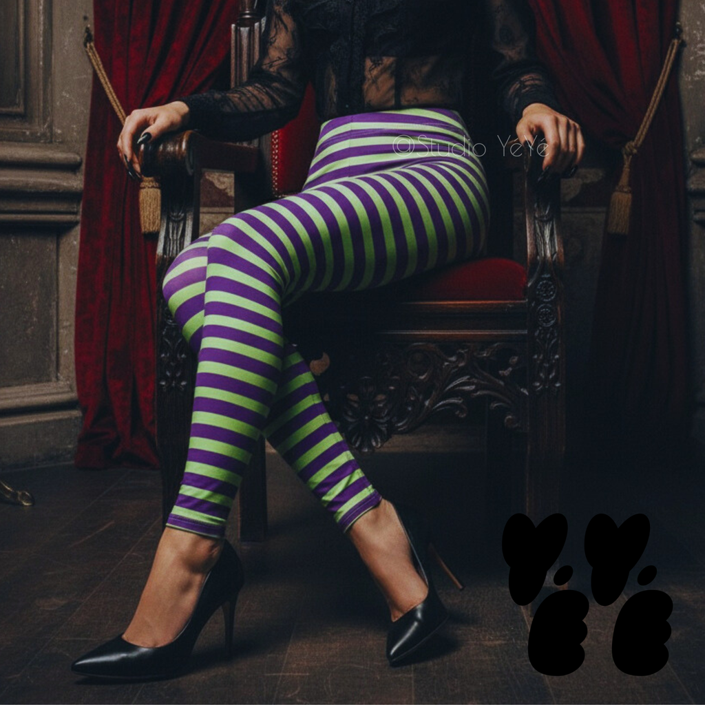 Lime green and purple horizontal stripe leggings by YéYé, styled with a black lace ruffle blouse and black stiletto heels on a gothic throne with red velvet curtains