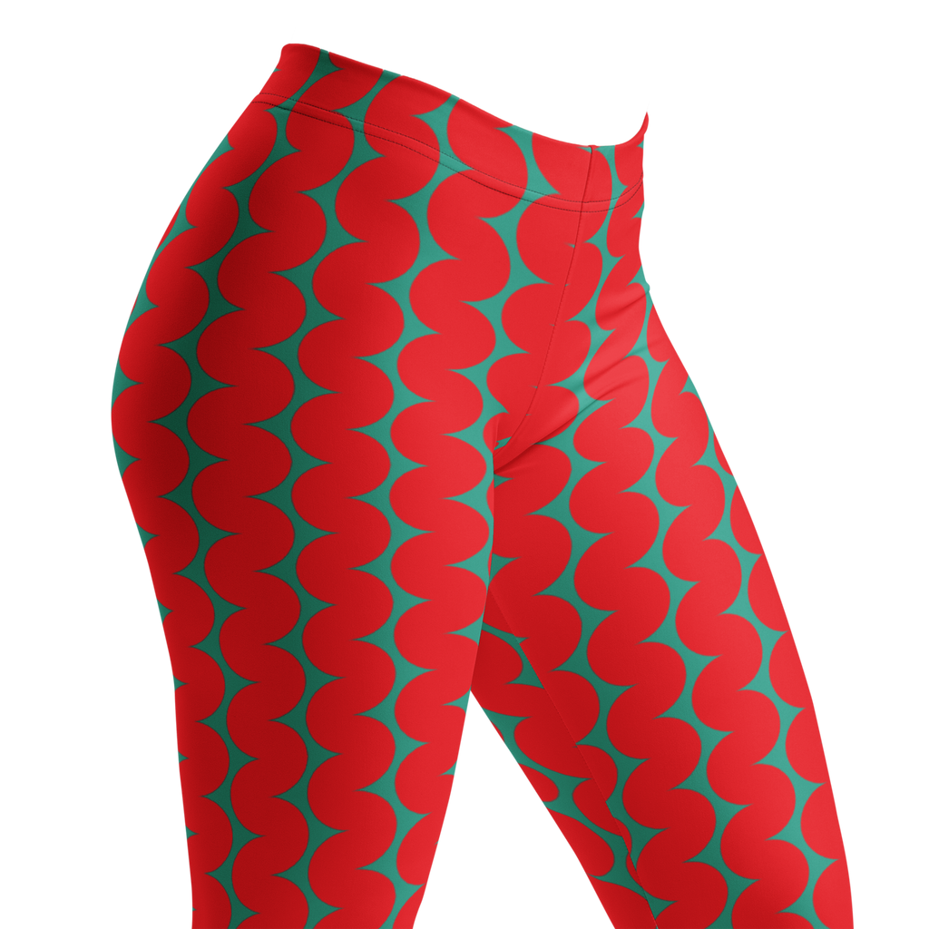 Designed by Studio YéYé — bold red and teal wiggly stripes, graphic and full of energy. Recycled materials, UPF 50+, squat-proof. Free US/EU shipping.